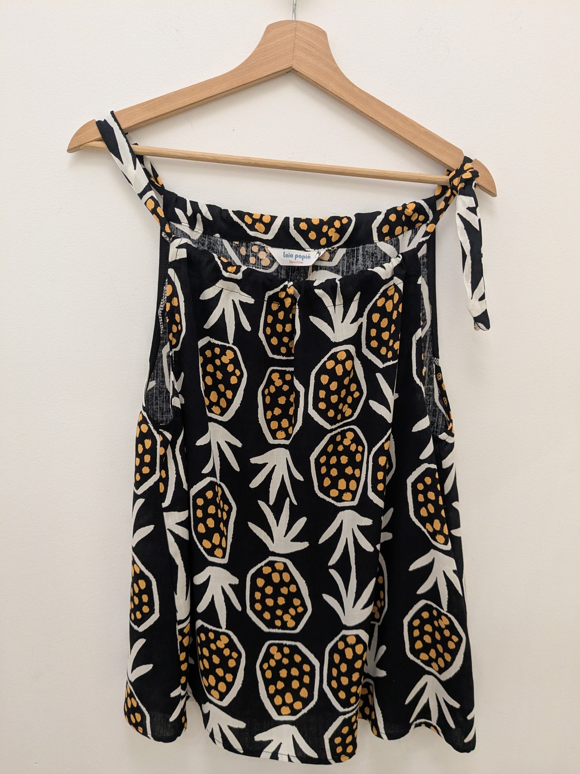 Top Piña negro y naranja